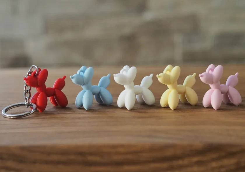 Llaveros de perro globo